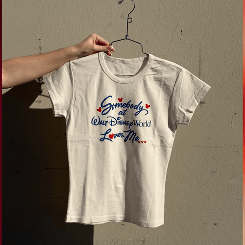 Rope Drop Threads Merch 2026 Somebody Loves Me Baby Tee Best Gifts For Her